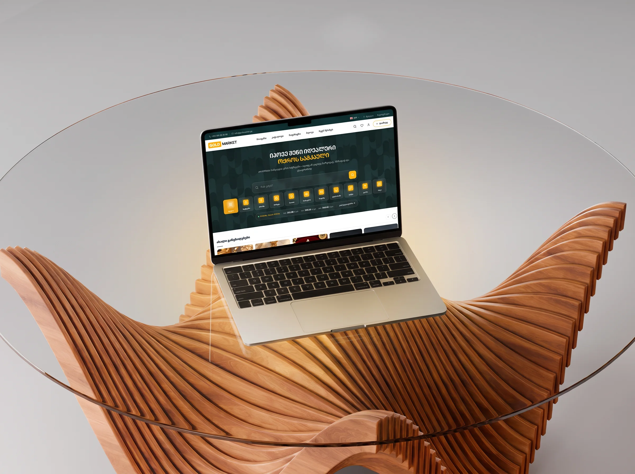 Goldmarket marketplace on a MacBook lying on a wave of golden wood slats