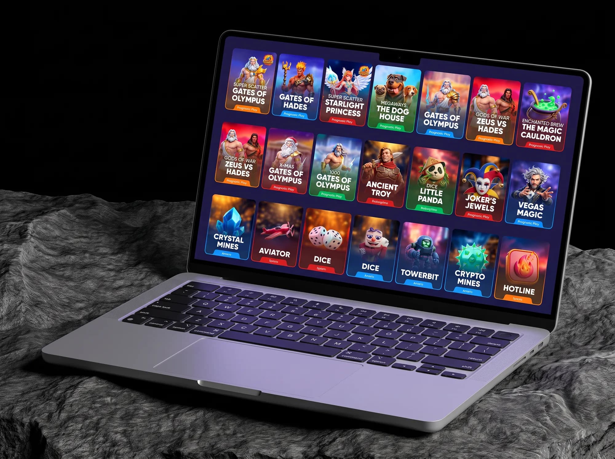 The game card wall, close on the MacBook screen between rocks